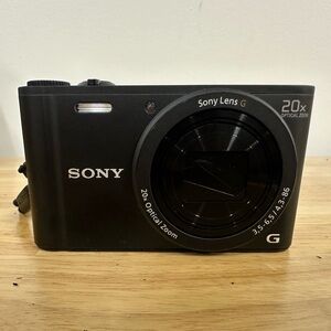 Sony Cyber -Shot 18.5 MP Digital Compact Camera 20x Optical Zoom.
